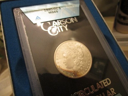 GEM QUALITY GSA ENCASED 1880-CC MORGAN DOL  ANACS MS 65  A TOUGHER DATED MORGAN