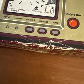 NINTENDO GAME & WATCH  HELMET  GOLD BOXED WITH MANUAL 1981 Working