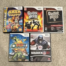 Nintendo Wii 5 Game Lot including Guitar Hero 5 and World Tour