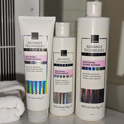 Avon REVIVING BOND REPAIR 3 Teile Set Shampoo Kur Spülung reduziert Haarbruch