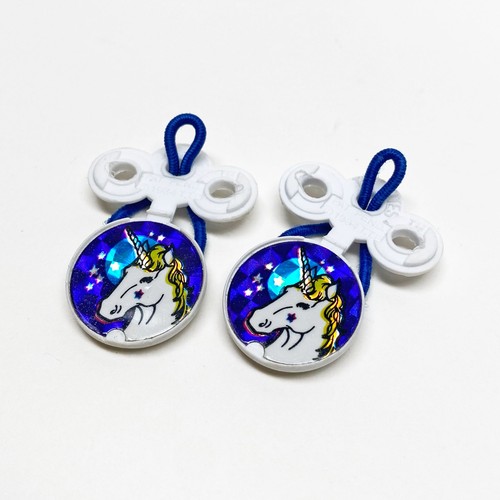 Vintage 1984 Tie Tites Keep Schnürsenkel gebunden elastisch holografisch Einhorn Kunststoff Charm - Bild 1 von 2