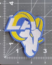 St. Louis Rams Mascot Undergoes Haircut for Topps Relic Cards 14