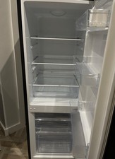 Hotpoint Fridge Freezer 50/50 In Working Order and In Good Condition. All Black