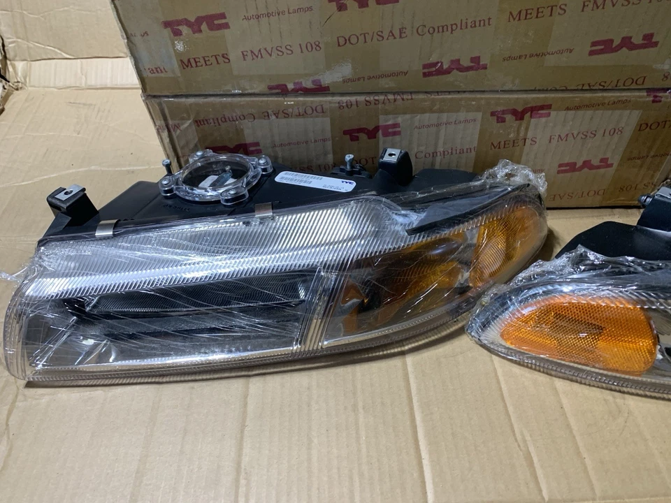 Juego de faros delanteros izquierda derecha Dodge Stratus Chrysler Cirrus 1995-2000 Foto 3 de 4
