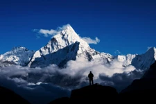 Man Hiking Silhouette In Mount Everest Himalayan Mountains Poster 18x12