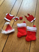 Vintage Mini Christmas Stockings And Santa Suit On Clothes Line