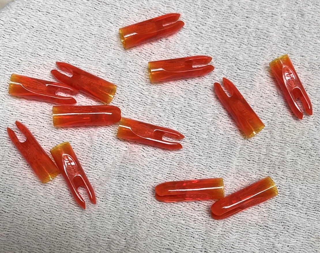 1 DZ VINTAGE FLO ORANGE 1/4” ORIGINAL AAE PLASTINOCK GLUE ON SNAP ARROW NOCKS