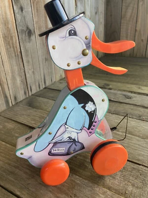 Jouet 1er âge en bois - Canard Dr Duck à tirer - jouet Fisher Price vintage - Photo 1/4