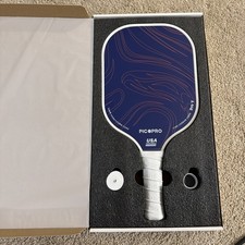 Pickleball racket, pic. pro paddle. New in the box never been used