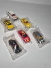 Vintage Lot of 6 Hot Wheels Getty Promo Cars Unopened