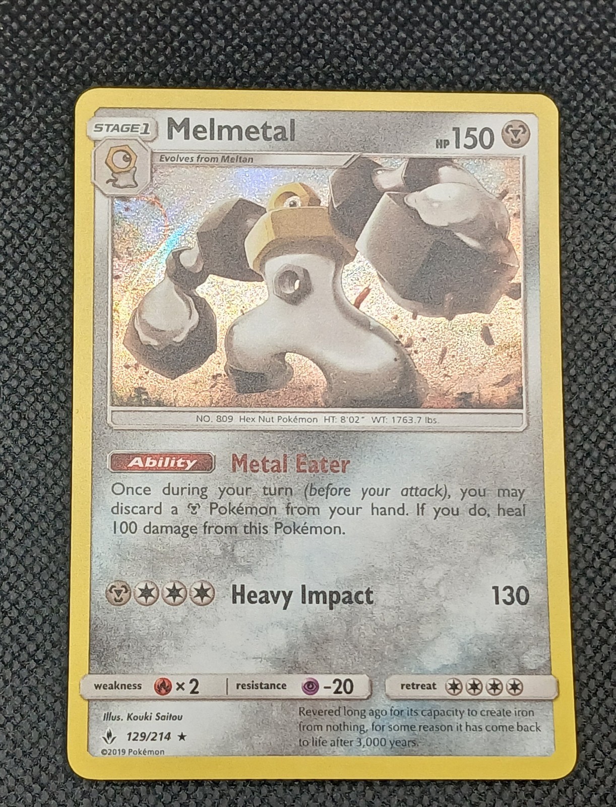Melmetal 129/214 Holo Rare Unbroken Bonds Pokemon Holo Near Mint