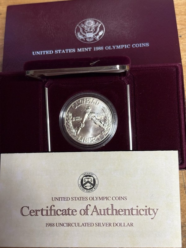 1988 S United States Mint Olympic Coins Silver Dollar, Uncirculated With COA