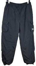 Pantalones de chándal Wilson Advantage para hombre negros cargo swish puño con cremallera Y2K de colección