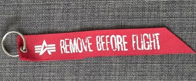Alpha Industries Schlüsselanhänger Remove Before Flight