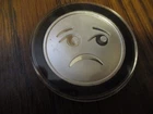 ONE TROY OZ. EMOJIS FROWNING FACE  SILVER ROUND  TOTAL ONE TROY OZ.