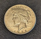 (1) Peace Silver Dollar 1922-S -  Premium Grade X-Fine - Nice w/ feathers