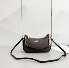 Coach  Brand new Teri shoulder bag with tags, classic canvas, CV933, gold/Brown.