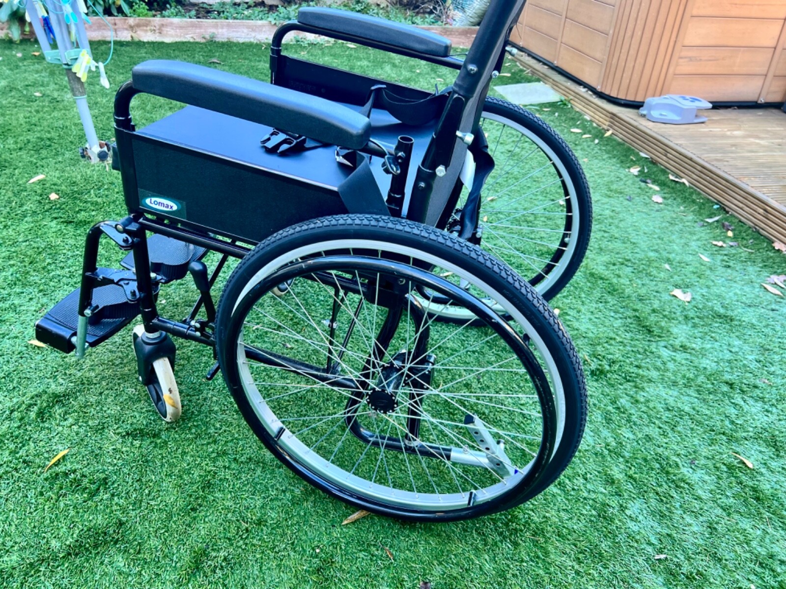 Lomax folding manual Wheelchair Black with removable cushion. Nearly