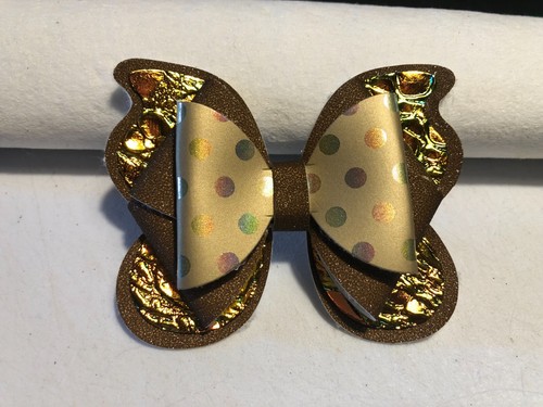 MOÑO DE PELO DISEÑO MARIPOSA. ORO MARRÓN Y HOLOGRÁFICO. 3,5" X 3". HOMECHO - Imagen 3 de 3