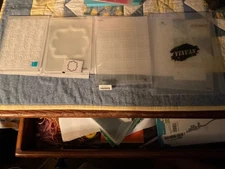 four embossing folders. see pictures. previously owned.