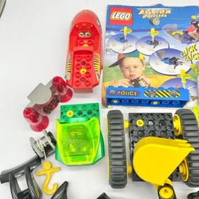 Lego Action Wheelers Misc Pieces Set -Figures Vehicles Tools Instructs Vtg 2909