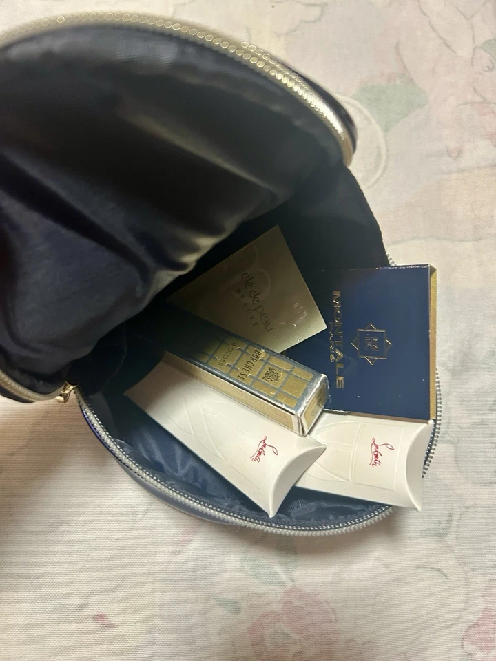 Juego de belleza de lujo - Montale, Louboutin, Clé de Peau, brillo de pétalos Borghese + bolsa Foto 2 de 4