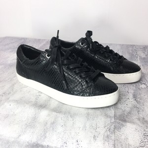 black leather plimsolls