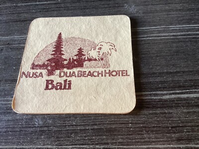 ANKER Bir    Nusa Dua Beach Hotel Bali   BEER  Coaster DAMAGED one side.