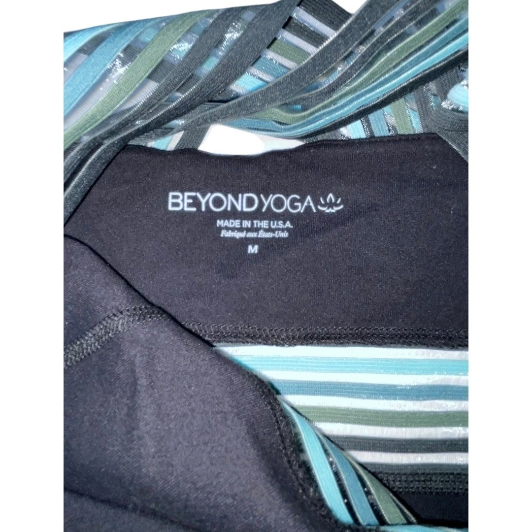 beyond-yoga green striped criss cross strap tank-bra