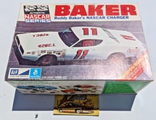 VINTAGE ORIGINAL MPC BUDDY BAKER NASCAR DODGE CHARGER MODEL KIT SEALED BAG  1/25