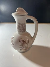 small pitcher with lid