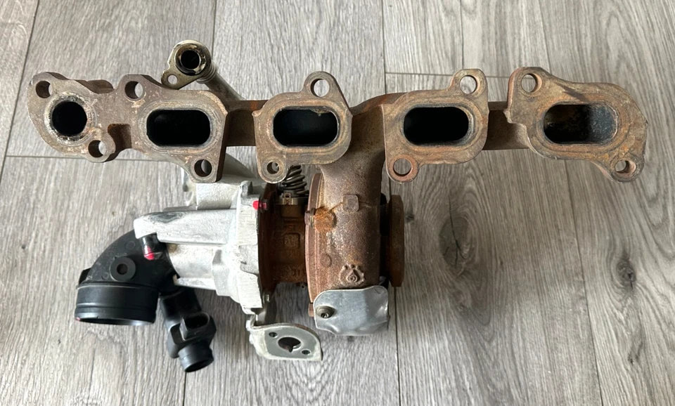 Audi A3 2015 Volkswagen VW Golf turbocompresor turbo, 04L253010B, original OEM Foto 2 de 4