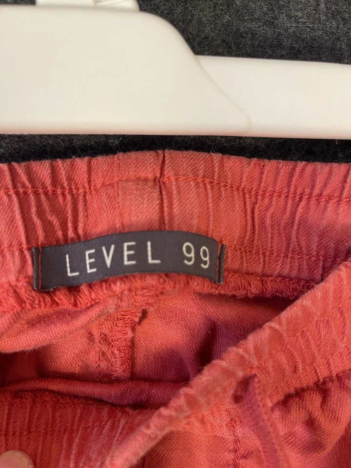 Pantalones cortos naranja Level 99 para mujer talla M Foto 4 de 4