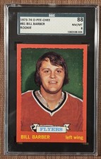 1973 O-Pee-Chee #81 Bill Barber Philadelphia Flyers Rookie Hockey Card SGC 8 RC. rookie card picture