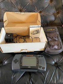 Atari Lynx Console With Case, AC adaptor, complete box, instructions, 4 games