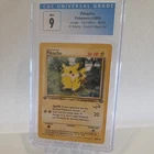 1999 POKEMON JUNGLE 1ST ED W STAMP - DUELIST MAGAZINE #60/64 PIKACHU CGC 9