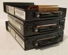 LOT OF THREE vintage AST hard drive caddies - ENCLOSURES ONLY NO DRIVES 386 era