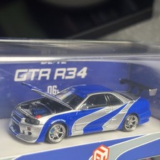 Focal Horizon 1/64 Nissan Skyline GT-R R34 (NFS9 Classic Liery) to 999