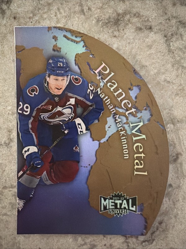 2021-22 SkyBox Metal Universe Nathan MacKinnon Planet Metal Gold