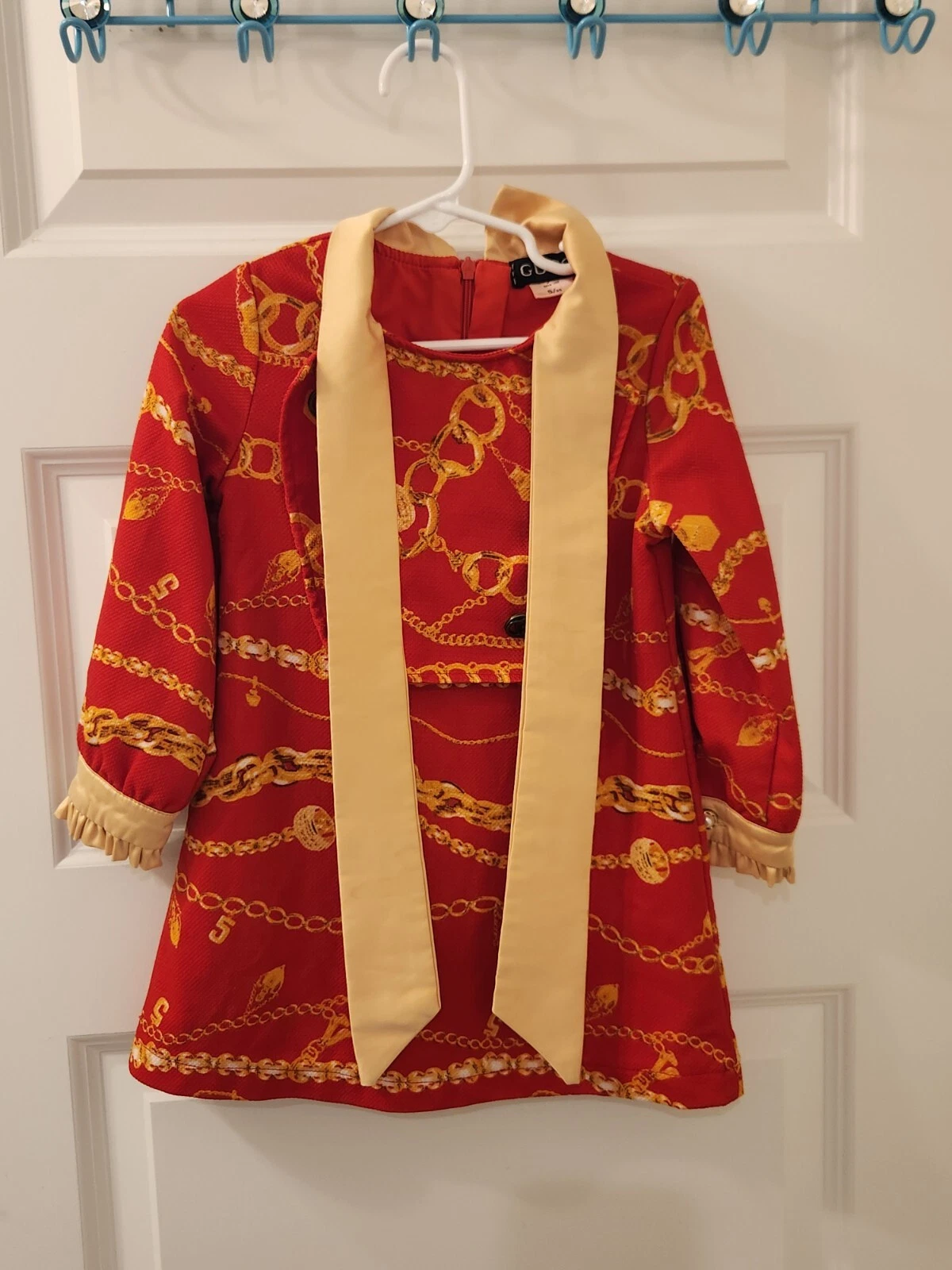 Robe fille Gucci enfant taille 5/95 rouge chaînes dorées manches longues