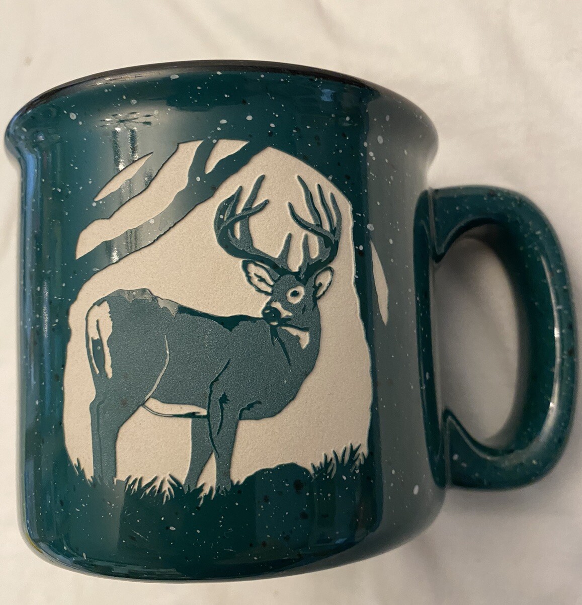 Medium Sized Green Deer Etched Coffee Cup.  Outer Color Is Green, Inner Black