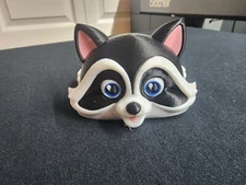 Multicolored 3d printed Racoon with moving parts.