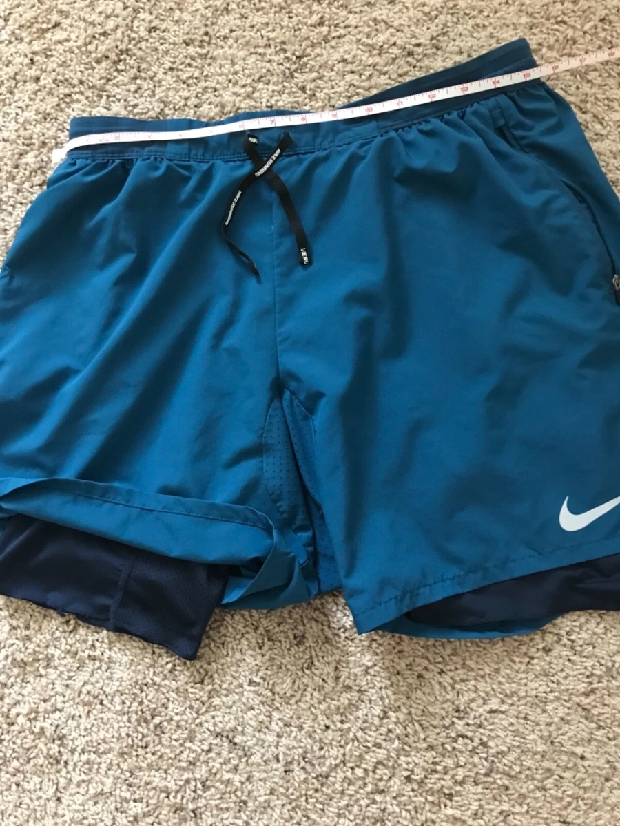 Nike Dri Fit Running Shorts w/inner support tights and zipped pockets Large