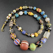 Antiguo collar de cuentas Millefiori, elegante, mofeta de ojo, rey veneciano africano comercio