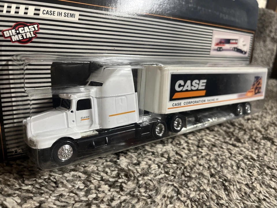 ERTL 1:64 Kenworth T600B Semi Case IH Construction Corporation w/ Skid Steer NEW - Image 2 of 3