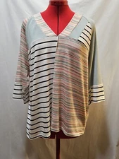 Sugarfox Multicolor Mixed Pattern V-neck Blouse. Size Medium