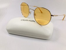 New Calvin Klein CK18104S 717 Round Gold  Maize Sunglasses with Case