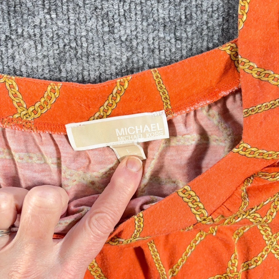Blusa boho Michael Kors naranja con estampado de cadena talla L manga campana - defectuosa Foto 2 de 4