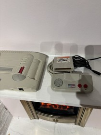 Amstrad GX4000 Console with Burning Rubber Game and Controller