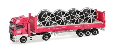 Herpa 960335 | MAN eTGX GX | 40ft Flatrackcontainerauflieger mit Kabeltrommeln - Bild 1 von 4